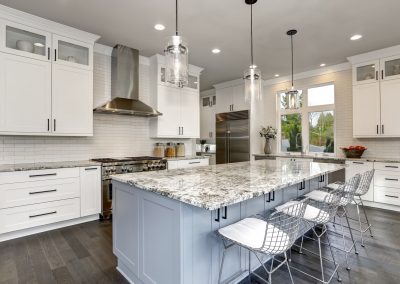 white modern kitchen with marble island bar